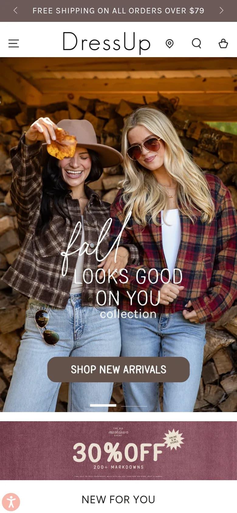 Dress Up online boutique on a phone with a Shop New Arrivals button