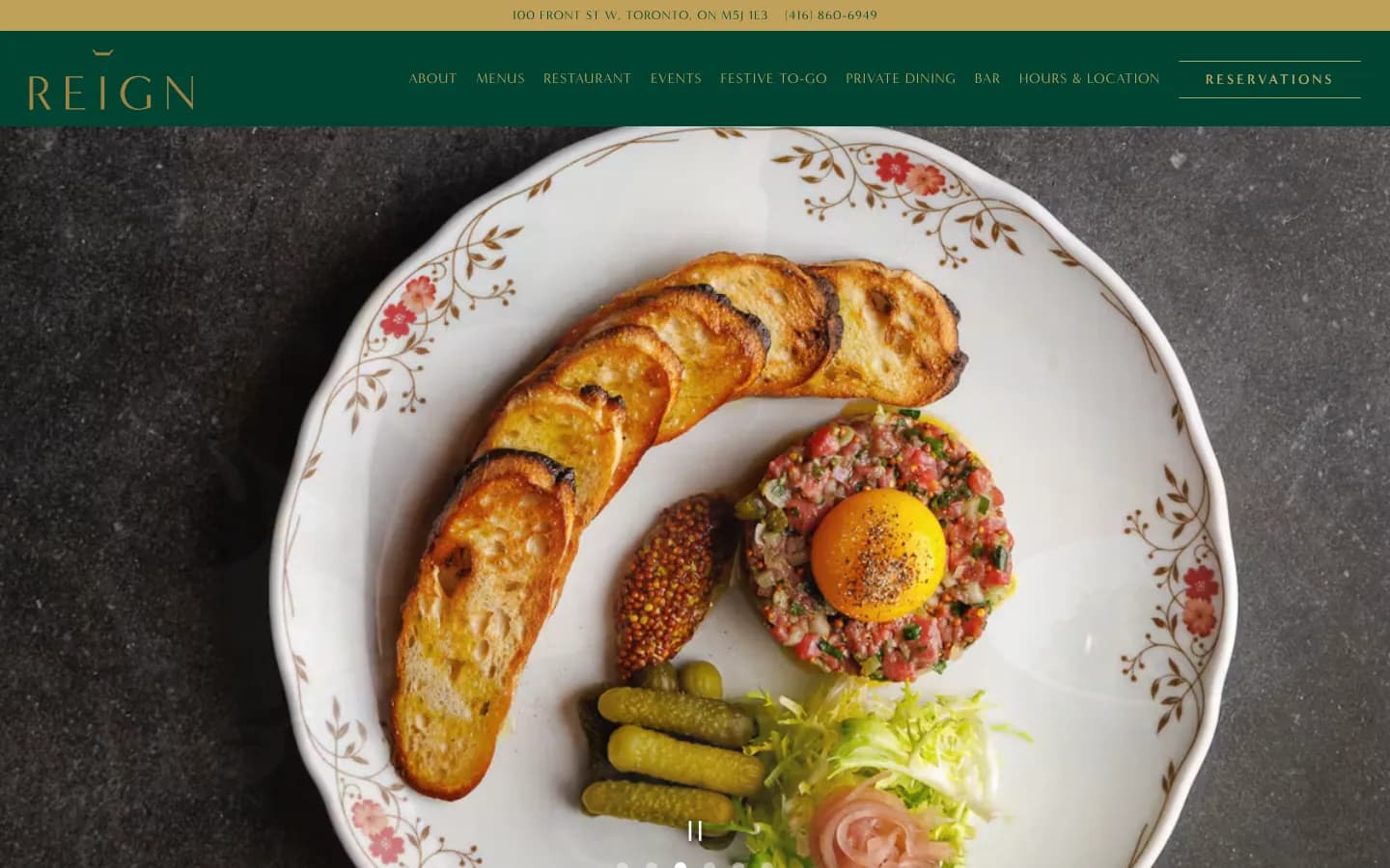 REIGN Toronto restaurant website home page with a plated dish on a patterned plate